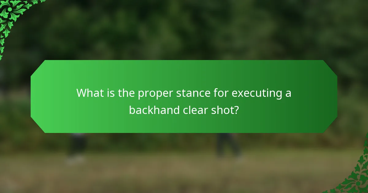What is the proper stance for executing a backhand clear shot?